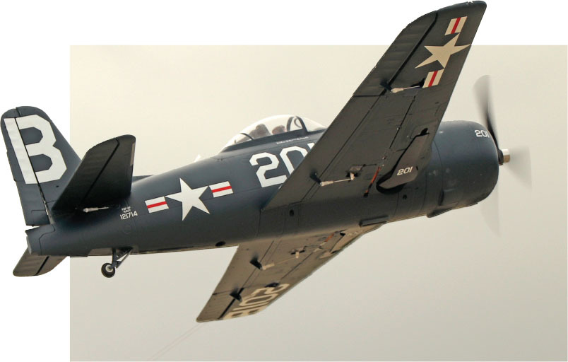 Pete Mazur’s Fun Scale foam ARF Bearcat is shown with the gear retracted. You can see the linkage for the flaps. 