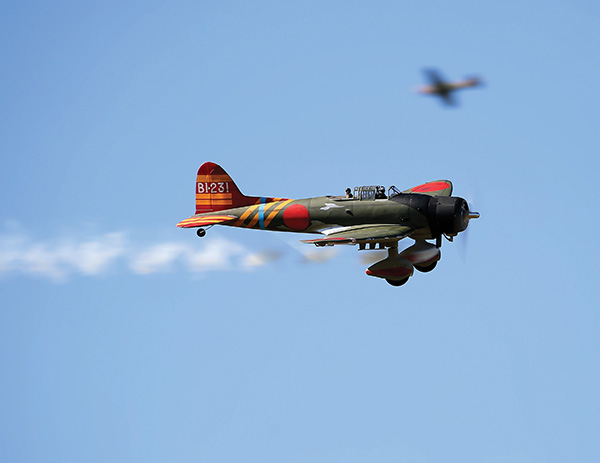 Fitz Walker hits the smoke on his Aichi D3A Val dive bomber. 