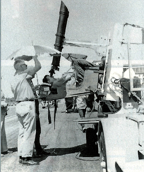 Circa 1963. DCRC club organized a world altitude record attempt. The Navy provided 40-power binoculars on a gun mount for manual tracking of the model. Maynard is shown at the controls. Davis photo.