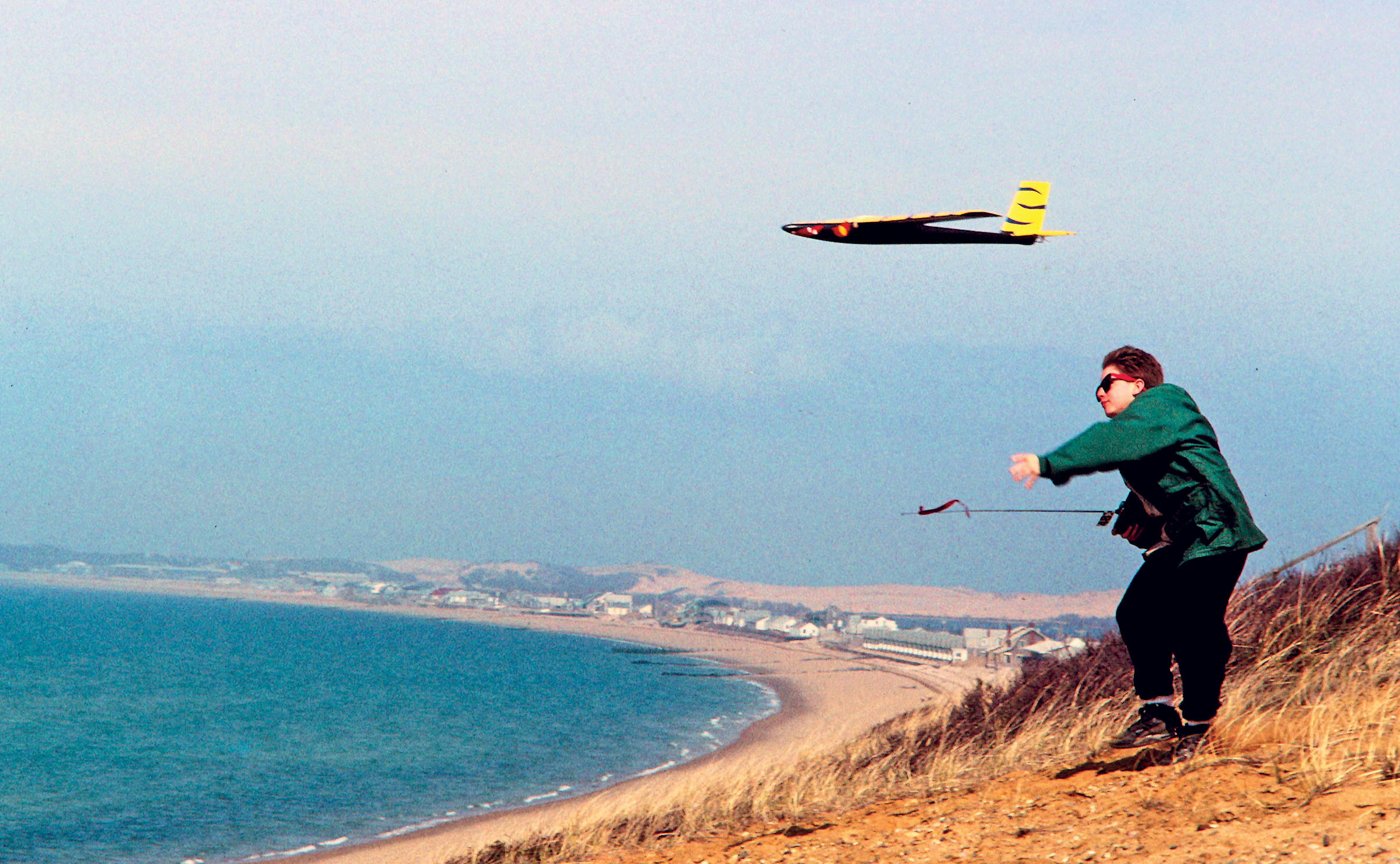 a young lou garwood launches over cape cod bay