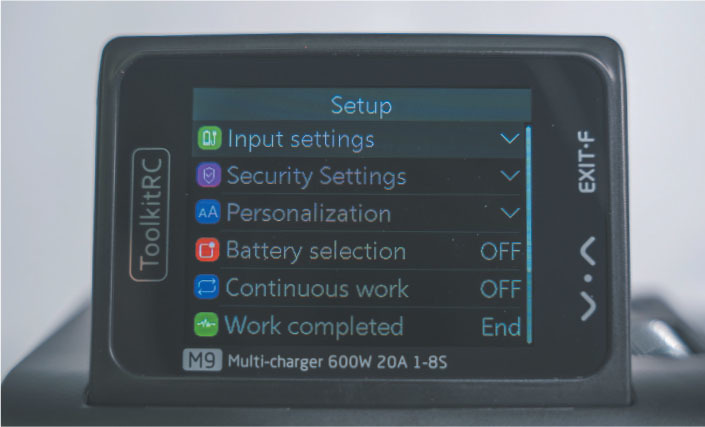 The Setup options on the M9 are accessed by pressing the jog-wheel button for roughly 3 seconds. 
