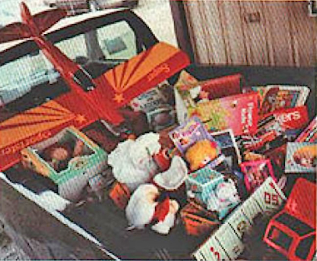A pickup truck full of toys on its way to a community center in the Ft. Wayne area. The Marines distribute 22,000-25,000 toys annually within a 125-mile radius of Ft. Wayne, and they never have too many!
